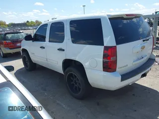2007 Chevrolet Tahoe LS with VIN 1GNFC13C77J404051, listed as a IAAI auction lot 42093772 with 213,729 mi miles and . Bid and sale history available at DreamBid. Image 3.