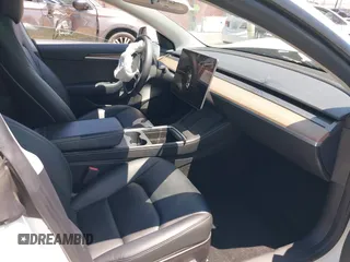 2022 Tesla Model 3 z VIN 5YJ3E1EA6NF332281, wystawiony jako IAAI lot #42198946 z przebiegiem 54 220 mil mil oraz . Historia ofert i sprzedaży dostępna na DreamBid. Obrazek 5.