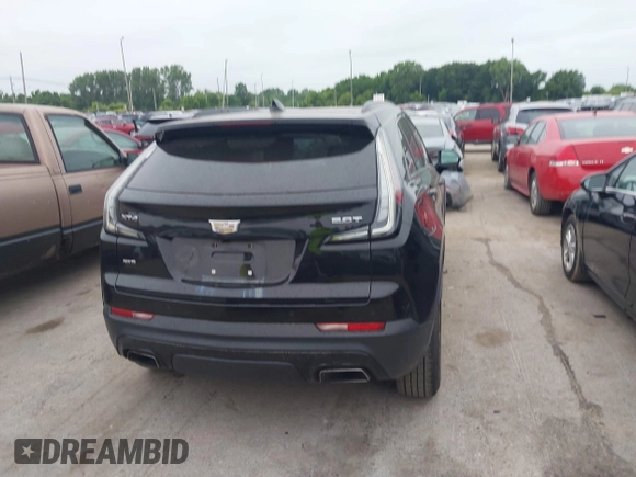 2019 Cadillac XT4 AWD Sport z VIN 1GYFZFR48KF197731, wystawiony jako IAAI lot #42668639 z przebiegiem 73 170 mil mil oraz . Historia ofert i sprzedaży dostępna na DreamBid. Obrazek 16.