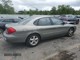 2003 Ford Taurus SES Standard with VIN 1FAFP55U73G271248, listed as a Copart auction lot 63309835 with 126,787 mi miles and Clean title. Bid and sale history available at DreamBid. Image 3.
