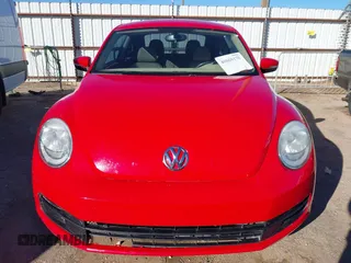 2013 Volkswagen Beetle with VIN 3VWHX7AT3DM682758, listed as a IAAI auction lot 40869170 with 88,793 mi miles and . Bid and sale history available at DreamBid. Image 12.