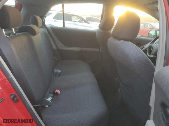 2009 Toyota Yaris with VIN JTDKT903995232885, listed as a Copart auction lot 71397904 with 112,804 mi miles and Salvage Title. Bid and sale history available at carsss.com. Image 11.