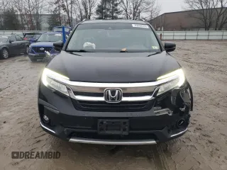 2020 Honda Pilot Touring 7-Passenger z VIN 5FNYF6H67LB003593, wystawiony jako Copart lot #83658334 z przebiegiem 105 575 mil mil oraz Szkoda całkowita • Salvage title. Historia ofert i sprzedaży dostępna na DreamBid. Obrazek 5.