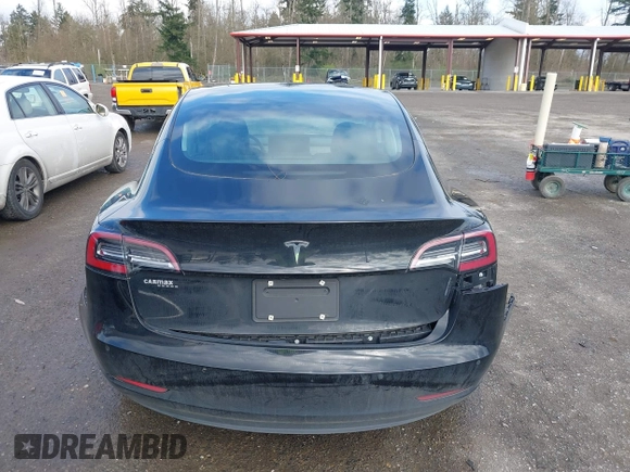2019 Tesla Model 3 Mid Range with VIN 5YJ3E1EA4KF305611, listed as a IAAI auction lot 41916738 with 59,101 mi miles and . Bid and sale history available at carsss.com. Image 16.