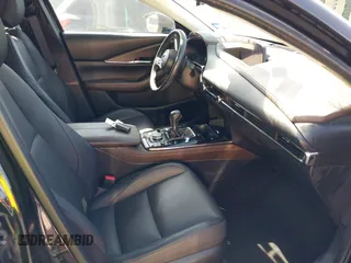 2024 Mazda CX-30 S Premium with VIN 3MVDMBDM4RM651543, listed as a IAAI auction lot 41993345 with 25,675 mi miles and . Bid and sale history available at DreamBid. Image 5.