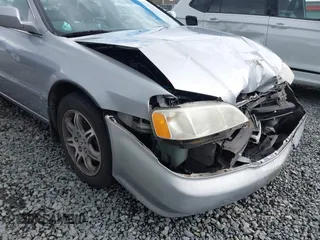 1999 Acura TL with VIN 19UUA5657XA021688, listed as a IAAI auction lot 41997466 with 241,232 mi miles. Bid and sale history available at carsss.com. Image 6.