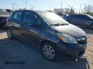 2013 Toyota Yaris L with VIN JTDKTUD39DD543776, listed as a IAAI auction lot 41758128 with 228,595 mi miles. Bid and sale history available at carsss.com. Image 1.