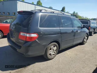 2005 Honda Odyssey EX-L z VIN 5FNRL38735B043791, wystawiony jako Copart lot #55844725 z przebiegiem 172 648 mil mil oraz Szkoda całkowita • Salvage title. Historia ofert i sprzedaży dostępna na DreamBid. Obrazek 3.