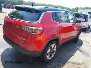 2021 Jeep Compass Limited with VIN 3C4NJDCB3MT599685, listed as a IAAI auction lot 42435075 with 58,426 mi miles and . Bid and sale history available at DreamBid. Image 4.