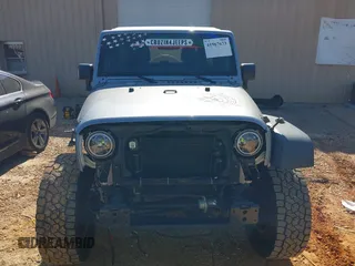 2017 Jeep Wrangler Unlimited Sport z VIN 1C4BJWDG2HL714822, wystawiony jako IAAI lot #41967673 z przebiegiem 95 165 mil mil oraz . Historia ofert i sprzedaży dostępna na DreamBid. Obrazek 12.
