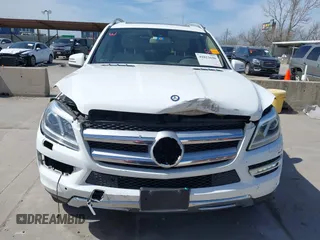 2016 Mercedes-Benz GL with VIN 4JGDF6EE4GA712535, listed as a IAAI auction lot 41822698 with 143,208 mi miles. Bid and sale history available at carsss.com. Image 6.