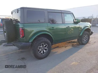 2023 Ford Bronco z VIN 1FMEE5DP2PLB43810, wystawiony jako IAAI lot #41656885 z przebiegiem 22 178 mil mil oraz . Historia ofert i sprzedaży dostępna na DreamBid. Obrazek 4.