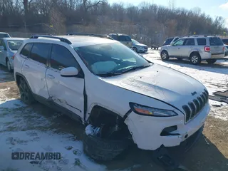 2015 Jeep Cherokee North with VIN 1C4PJMCS7FW792850, listed as a IAAI auction lot 41323432 with 102,642 mi miles. Bid and sale history available at carsss.com. Image 1.