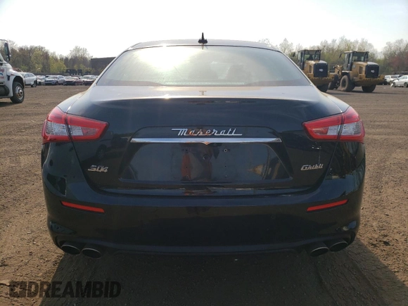 2018 Maserati Ghibli S Q4 z VIN ZAM57YTA5J1279909, wystawiony jako Copart lot #54559285 z przebiegiem 49 065 mil mil oraz Szkoda całkowita • Salvage title. Historia ofert i sprzedaży dostępna na DreamBid. Obrazek 6.