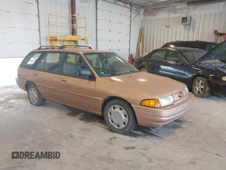 1994 Ford Escort with VIN 1FARP15J3RW212935, listed as a IAAI auction lot 42595461 with 90,056 mi miles and . Bid and sale history available at DreamBid. Image 1.