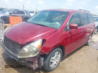 2006 Honda Odyssey EX-L with VIN 5FNRL38606B426919, listed as a IAAI auction lot 42077458 with 125,161 mi miles and . Bid and sale history available at carsss.com. Image 2.