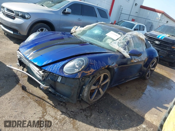 2022 Porsche 911 Carrera with VIN WP0CA2A96NS236957, listed as a IAAI auction lot 41154002 with 34,056 mi miles and . Bid and sale history available at DreamBid. Image 18.