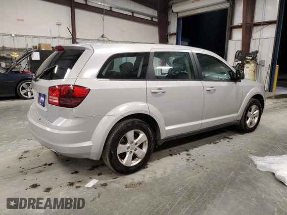 2013 Dodge Journey American Value z VIN 3C4PDCAB9DT536846, wystawiony jako Copart lot #86245174 z przebiegiem 162 677 mil mil oraz Szkoda całkowita • Salvage title. Historia ofert i sprzedaży dostępna na DreamBid. Obrazek 3.