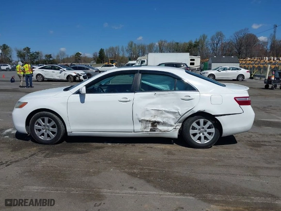 2007 Toyota Camry CE with VIN 4T1BE46K67U670953, listed as a IAAI auction lot 41894354 with 259,421 mi miles. Bid and sale history available at carsss.com. Image 14.