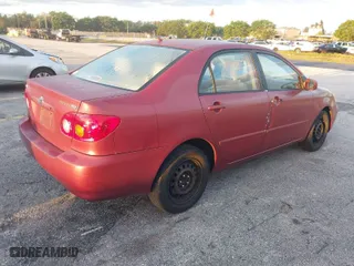 2004 Toyota Corolla CE with VIN JTDBR32E342018625, listed as a IAAI auction lot 42028132 with 208,808 mi miles. Bid and sale history available at carsss.com. Image 4.