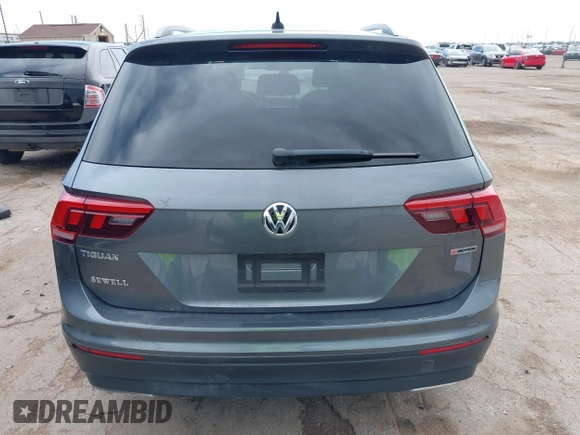2021 Volkswagen Tiguan S with VIN 3VV0B7AX0MM017433, listed as a IAAI auction lot 42017125 with 54,624 mi miles and . Bid and sale history available at DreamBid. Image 17.