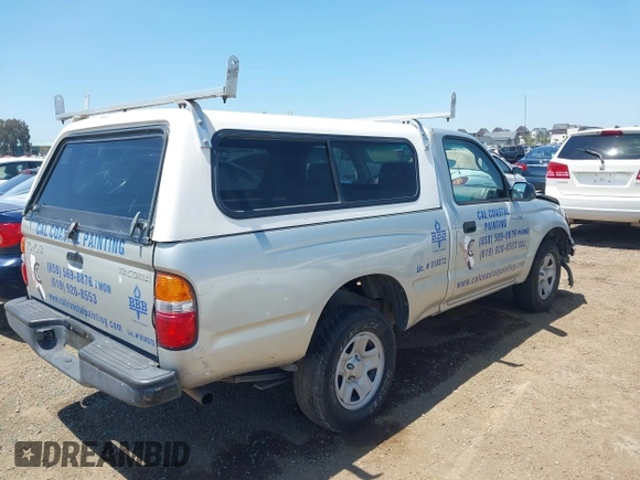 2001 Toyota Tacoma z VIN 5TENL42N11Z856292, wystawiony jako IAAI lot #42226178 z przebiegiem 333 577 mil mil oraz . Historia ofert i sprzedaży dostępna na DreamBid. Obrazek 4.