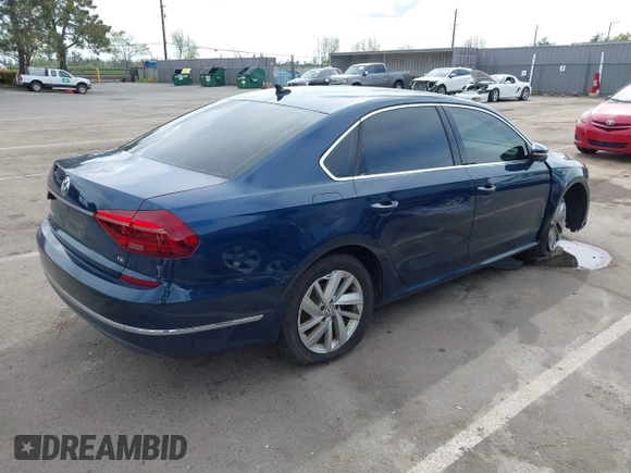 2018 Volkswagen Passat 2.0T SE with VIN 1VWBA7A30JC003243, listed as a IAAI auction lot 41895405 with 99,210 mi miles. Bid and sale history available at carsss.com. Image 4.