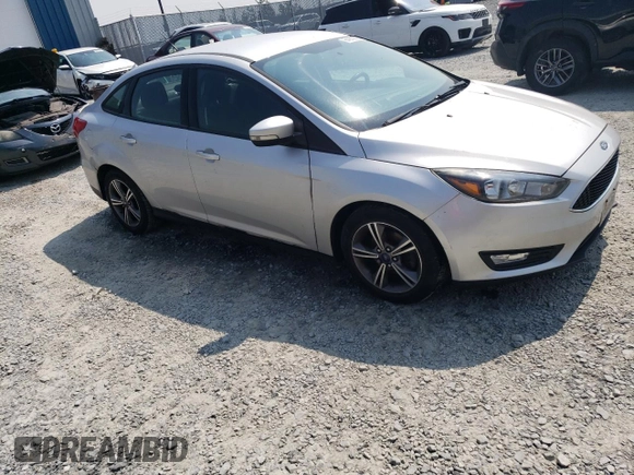 2016 Ford Focus SE with VIN 1FADP3FE8GL353103, listed as a Copart auction lot 64972865 with 131,403 mi miles and Clean title. Bid and sale history available at DreamBid. Image 4.