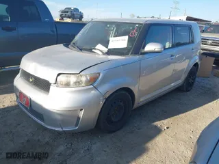 2009 Scion xB with VIN JTLKE50E991076881, listed as a IAAI auction lot 41842788 with 123,728 mi miles. Bid and sale history available at carsss.com. Image 2.