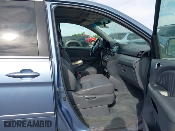 2007 Honda Odyssey EX-L z VIN 5FNRL38757B121989, wystawiony jako IAAI lot #42323131 z przebiegiem 174 906 mil mil oraz . Historia ofert i sprzedaży dostępna na DreamBid. Obrazek 5.