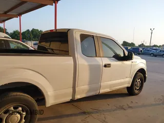 2015 Ford F-150 XL with VIN 1FTEX1CGXFKE20104, listed as a IAAI auction lot 42035347 with 196,674 mi miles. Bid and sale history available at carsss.com. Image 13.