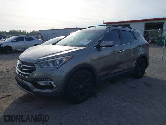 2017 Hyundai Santa Fe Sport 2.0T with VIN 5XYZU4LA0HG487276, listed as a IAAI auction lot 41441697 with 118,248 mi miles. Bid and sale history available at carsss.com. Image 2.