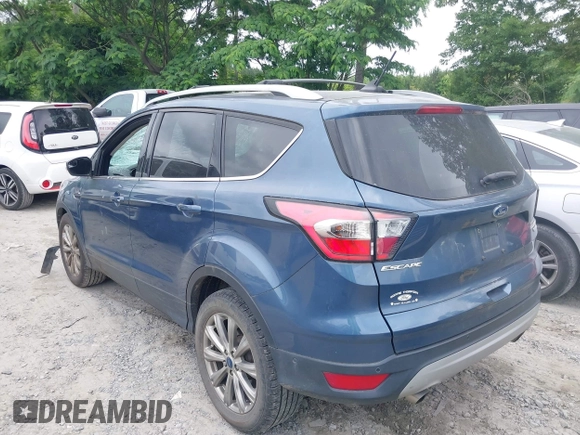 2018 Ford Escape Titanium with VIN 1FMCU0J99JUA12717, listed as a IAAI auction lot 42237509 with 123,896 mi miles and . Bid and sale history available at DreamBid. Image 14.