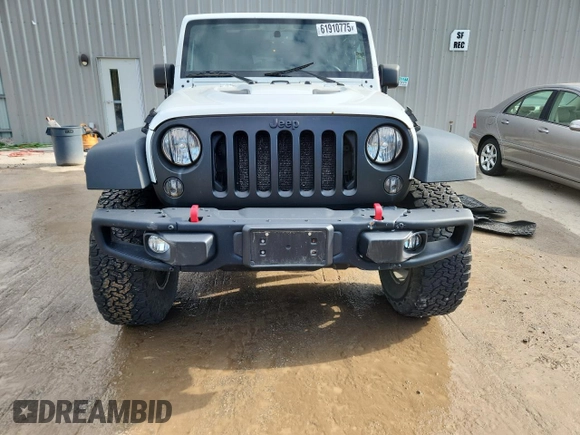 2015 Jeep Wrangler Unlimited Rubicon with VIN 1C4BJWFGXFL518301, listed as a Copart auction lot 61910775 with 153,945 mi miles and Clean title. Bid and sale history available at DreamBid. Image 5.