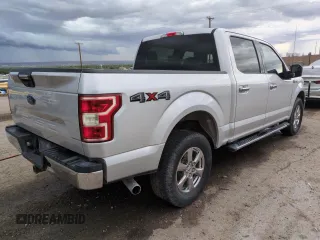 2018 Ford F-150 XL with VIN 1FTEW1E57JKC62666, listed as a Copart auction lot 61619235 with 149,759 mi miles and Clean title. Bid and sale history available at DreamBid. Image 3.
