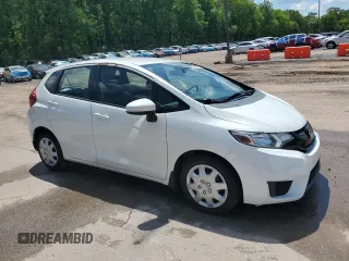2015 Honda Fit LX z VIN 3HGGK5H59FM760585, wystawiony jako Copart lot #55737365 z przebiegiem 79 700 mil mil oraz Szkoda całkowita • Salvage title. Historia ofert i sprzedaży dostępna na DreamBid. Obrazek 4.