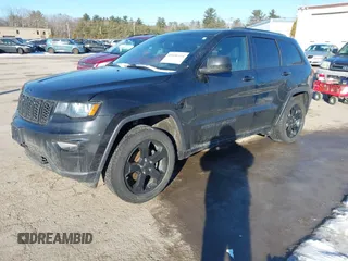 2018 Jeep Grand Cherokee Laredo E with VIN 1C4RJFAGXJC375588, listed as a IAAI auction lot 41406344 with 69,989 mi miles. Bid and sale history available at carsss.com. Image 2.