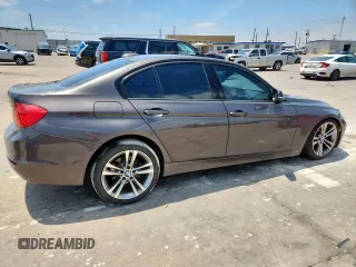 2015 BMW 3 Series 328i with VIN WBA3A5C55FF610865, listed as a Copart auction lot 59675825 with 186,429 mi miles and Salvage title. Bid and sale history available at DreamBid. Image 3.