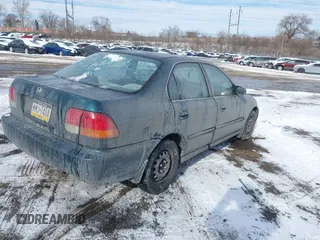 1998 Honda Civic EX with VIN 2HGEJ8647WH603464, listed as a IAAI auction lot 41376762 with 174,990 mi miles. Bid and sale history available at carsss.com. Image 4.