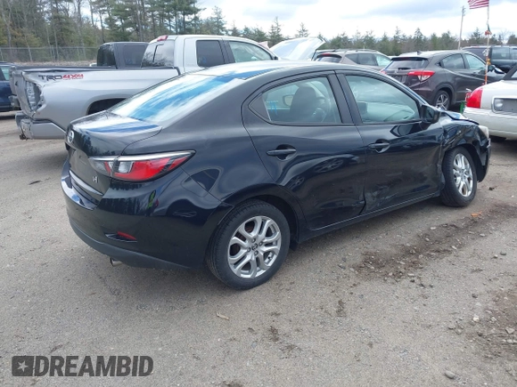2016 Scion iA with VIN 3MYDLBZV6GY107350, listed as a IAAI auction lot 42032841 with 106,109 mi miles. Bid and sale history available at carsss.com. Image 4.