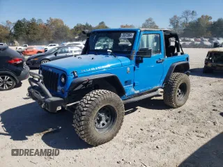 2011 Jeep Wrangler Rubicon z VIN 1J4BA6D15BL563410, wystawiony jako Copart lot #76973964 z przebiegiem 68 334 mil mil oraz Szkoda całkowita • Salvage title. Historia ofert i sprzedaży dostępna na DreamBid. Obrazek 1.