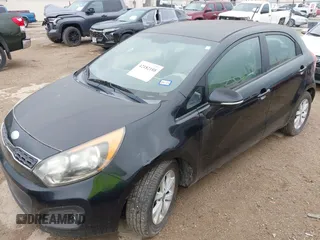 2013 Kia Rio SX with VIN KNADN5A36D6245572, listed as a IAAI auction lot 42182188 with 205,142 mi miles and . Bid and sale history available at DreamBid. Image 6.