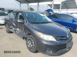 2011 Toyota Corolla L with VIN JTDBU4EE3BJ090749, listed as a IAAI auction lot 42106633 with 209,824 mi miles. Bid and sale history available at carsss.com. Image 1.