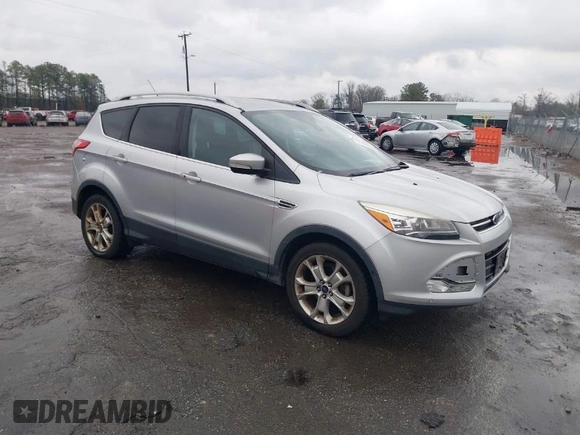 2016 Ford Escape Titanium with VIN 1FMCU0JX7GUB25573, listed as a IAAI auction lot 41871980 with 157,525 mi miles. Bid and sale history available at carsss.com. Image 1.