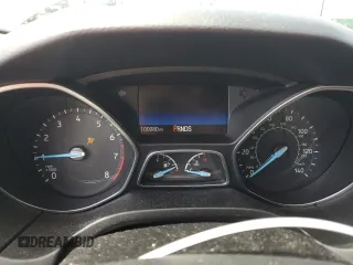 2018 Ford Focus SE with VIN 1FADP3FEXJL215912, listed as a Copart auction lot 50518385 with 100,080 mi miles and Salvage Title. Bid and sale history available at carsss.com. Image 9.