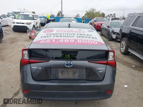 2022 Toyota Prius L Eco with VIN JTDKAMFU3N3190079, listed as a IAAI auction lot 41771356 with 52,607 mi miles and . Bid and sale history available at DreamBid. Image 16.