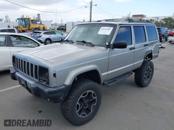 2000 Jeep Cherokee z VIN 1J4FF48S1YL200458, wystawiony jako IAAI lot #42239282 z przebiegiem Nie podano mil oraz . Historia ofert i sprzedaży dostępna na DreamBid. Obrazek 19.