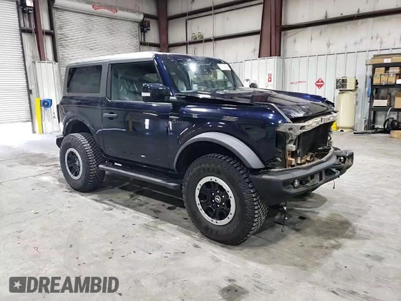 2021 Ford Bronco с VIN 1FMDE5CH0MLA60295, выставлен на аукционе Copart как лот 77109024 с пробегом 12 804 миль миль и Списание • Salvage title. История ставок и продаж доступна на DreamBid. Изображение 15.