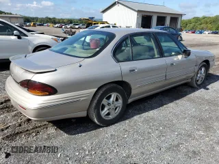 1997 Pontiac Bonneville SE z VIN 1G2HX52K7VH211607, wystawiony jako Copart lot #73705454 z przebiegiem 116 307 mil mil oraz Szkoda całkowita • Salvage title. Historia ofert i sprzedaży dostępna na DreamBid. Obrazek 3.