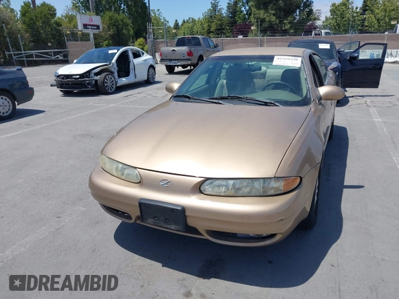 1999 Oldsmobile Alero GL z VIN 1G3NL52T1XC384073, wystawiony jako IAAI lot #42359330 z przebiegiem 177 869 mil mil oraz . Historia ofert i sprzedaży dostępna na DreamBid. Obrazek 6.